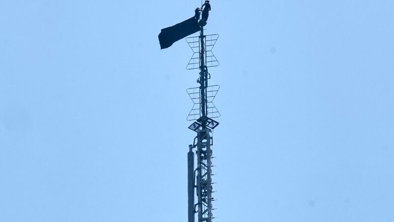 Una persona encima del Edificio Empire State de Nueva York el 1 de julio del 2026. (AP...