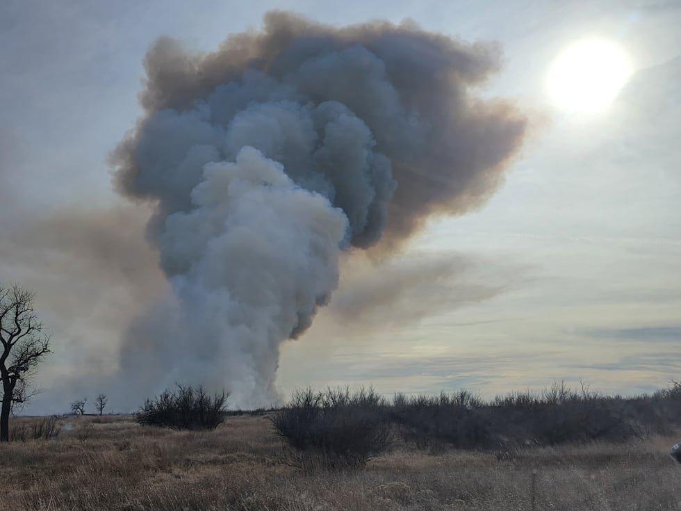 Crews are working to contain a grass fire in Beaver County, Oklahoma. (Credit: Booker Fire...