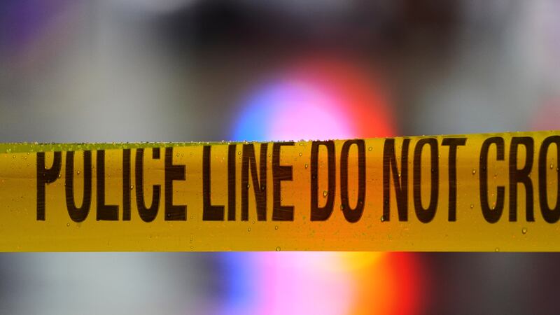 FILE - Crime scene tape surrounds a police investigation in Philadelphia, Friday, Jan. 31, 2025.