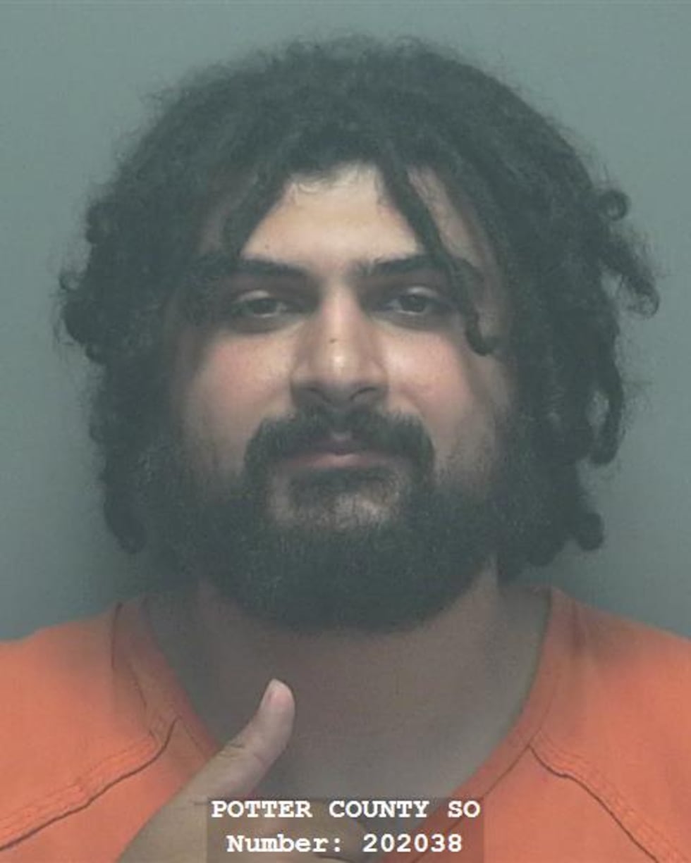 Khoshan, 27, is accused of striking another man with a handgun.