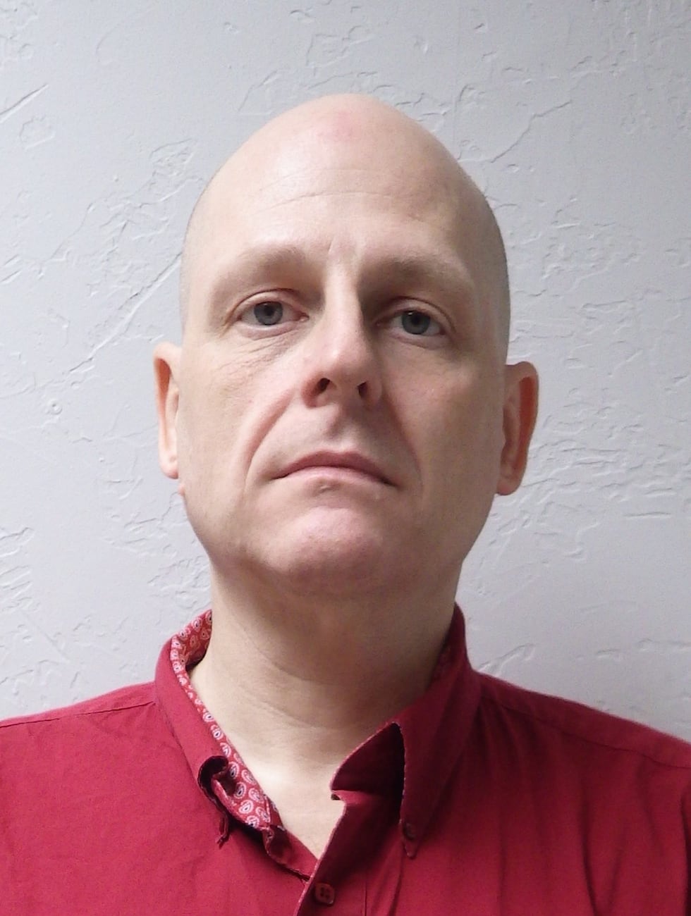 Tate, 56, as seen in his May 2025 sex offender registration photo. Tate pleaded guilty to...