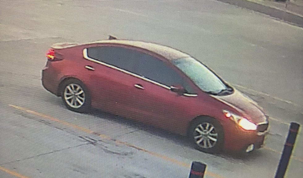 Officials say they are actively looking for the red sedan, which is believed to have damage to...