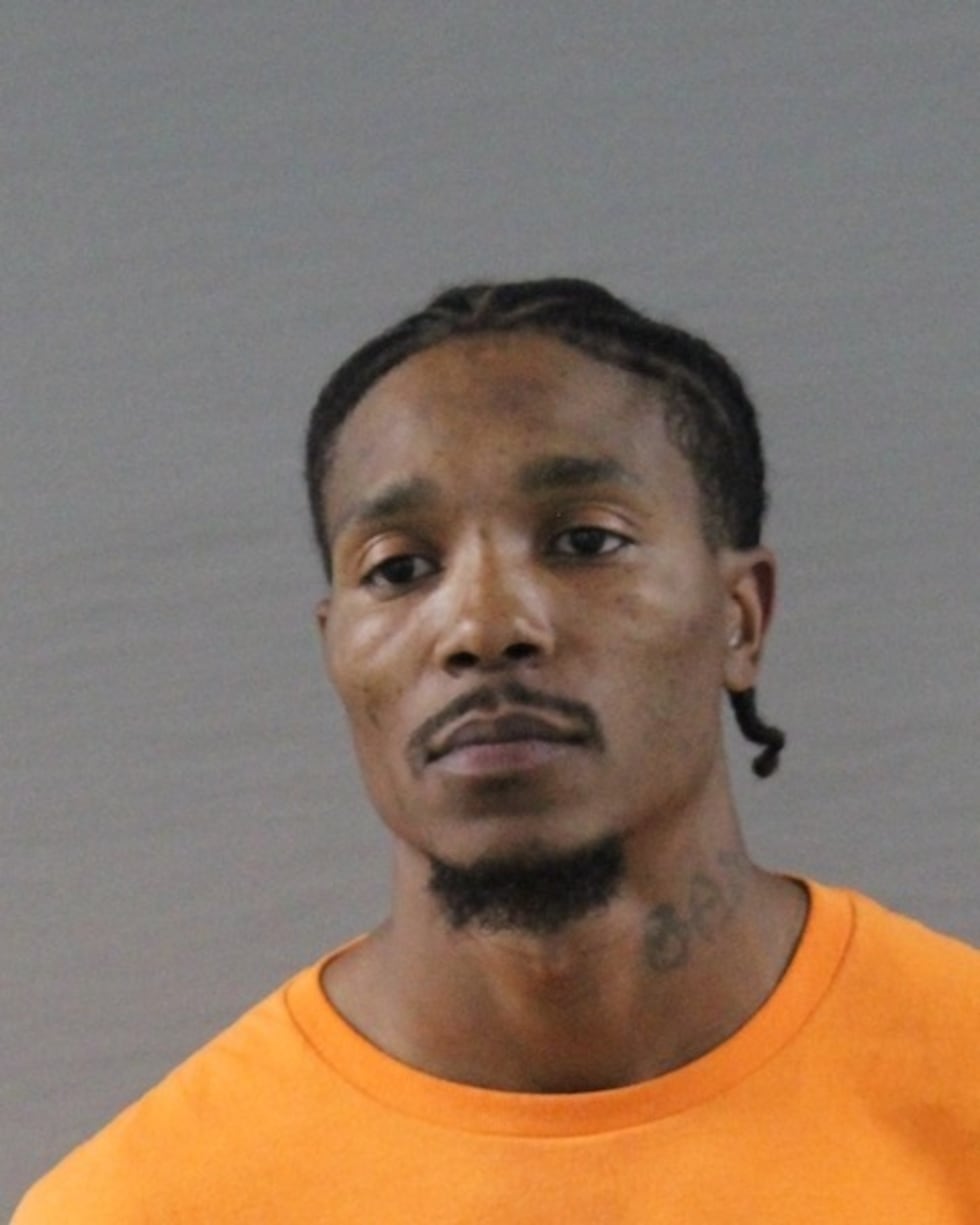 Davidson, 40, pleaded guilty to a federal charge of being a felon in possession of a firearm.